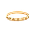 Floral Motif Yellow Gold Bangle