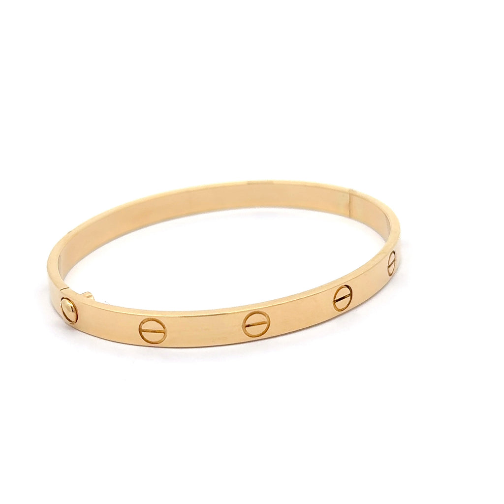 Yellow Gold Bangle Bracelet with Engraved Motifs